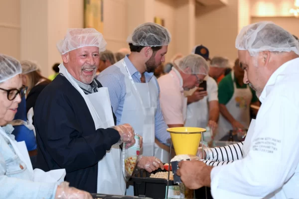 We Give Back - No Child Hungry food packing