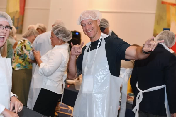 We Give Back - No Child Hungry food packing